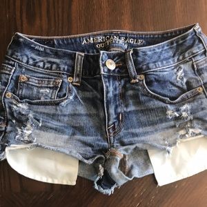 AE jean shorts with exposed front pocket